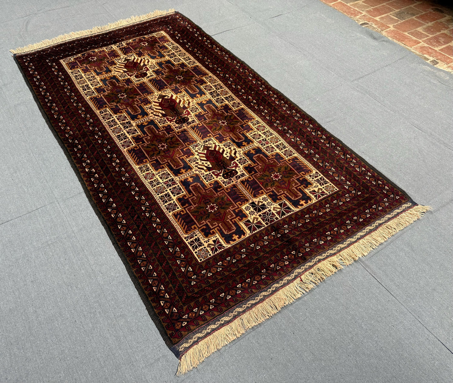 Traditional Baluch Wool Rug – Beige and Burgundy Handwoven Carpet,Bohemian Handmade Baluch Rug – Wool Carpet with Fringe and Ethnic Design.