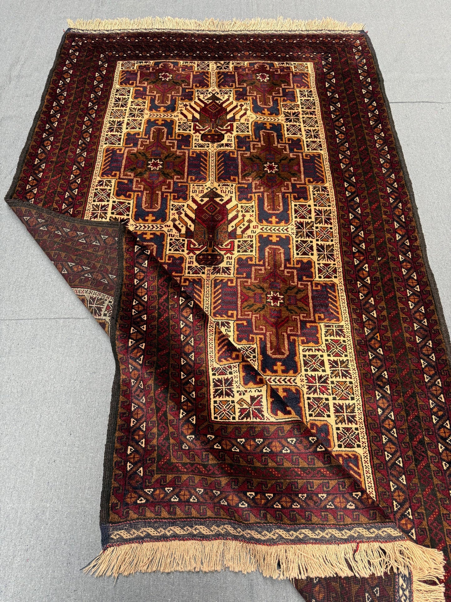 Traditional Baluch Wool Rug – Beige and Burgundy Handwoven Carpet,Bohemian Handmade Baluch Rug – Wool Carpet with Fringe and Ethnic Design.