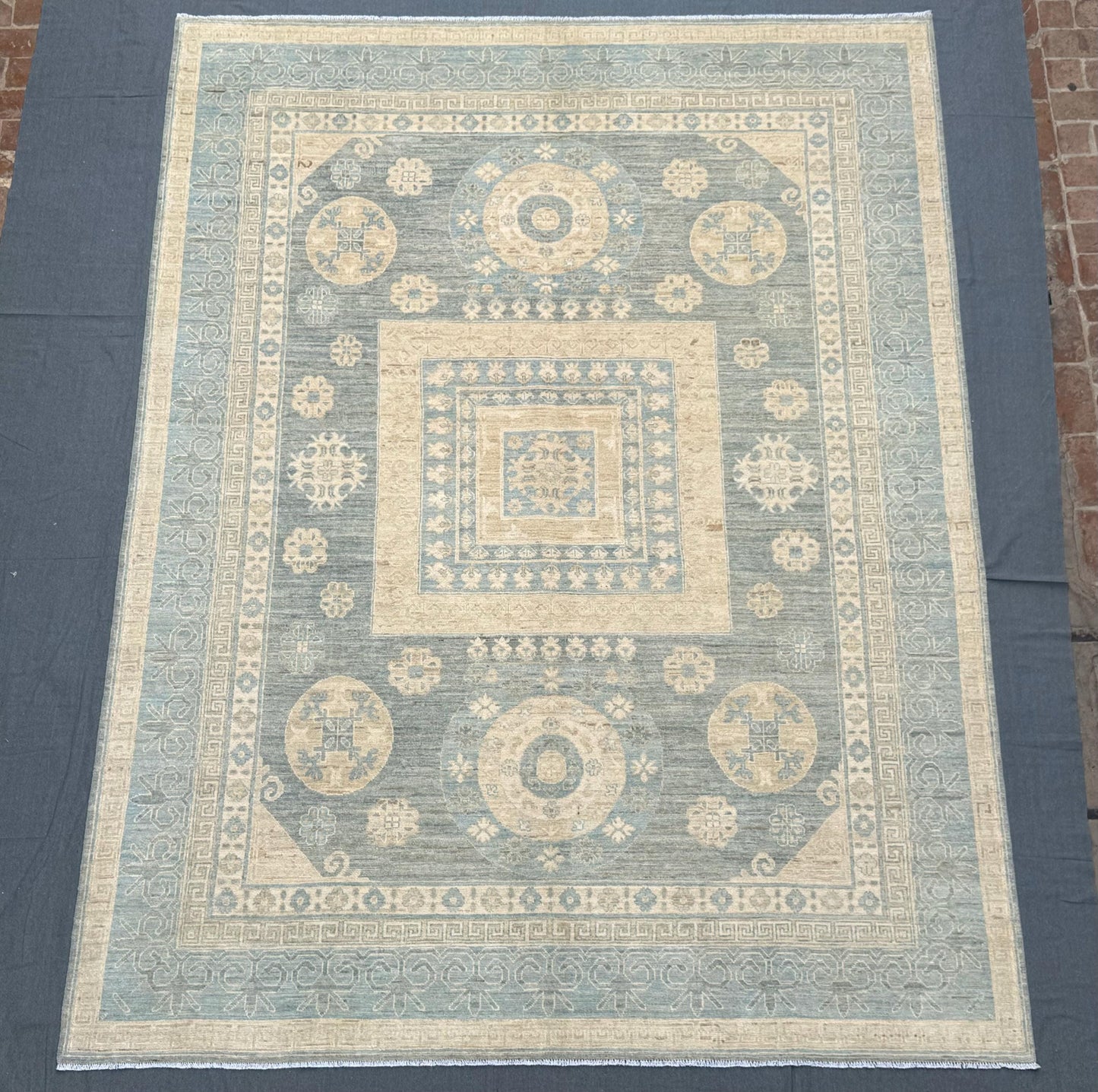 Handmade Turkish Oriental Rug 9x12 ft – Luxurious Wool Carpet with Subtle Geometric Motifs and Soft Pastel Tones for Living Spaces