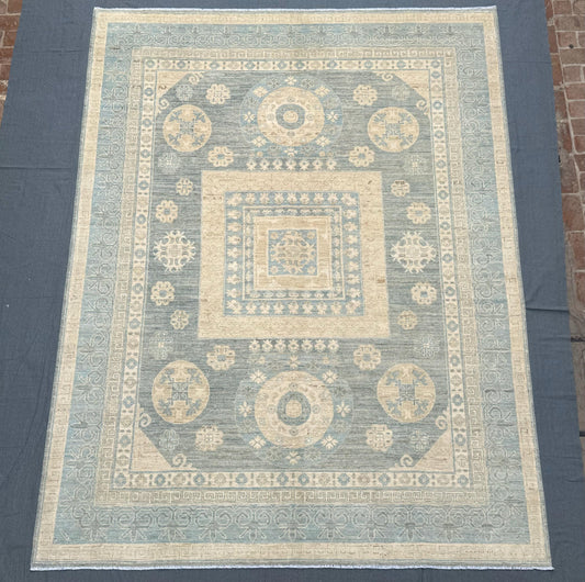 Handmade Turkish Oriental Rug 9x12 ft – Luxurious Wool Carpet with Subtle Geometric Motifs and Soft Pastel Tones for Living Spaces