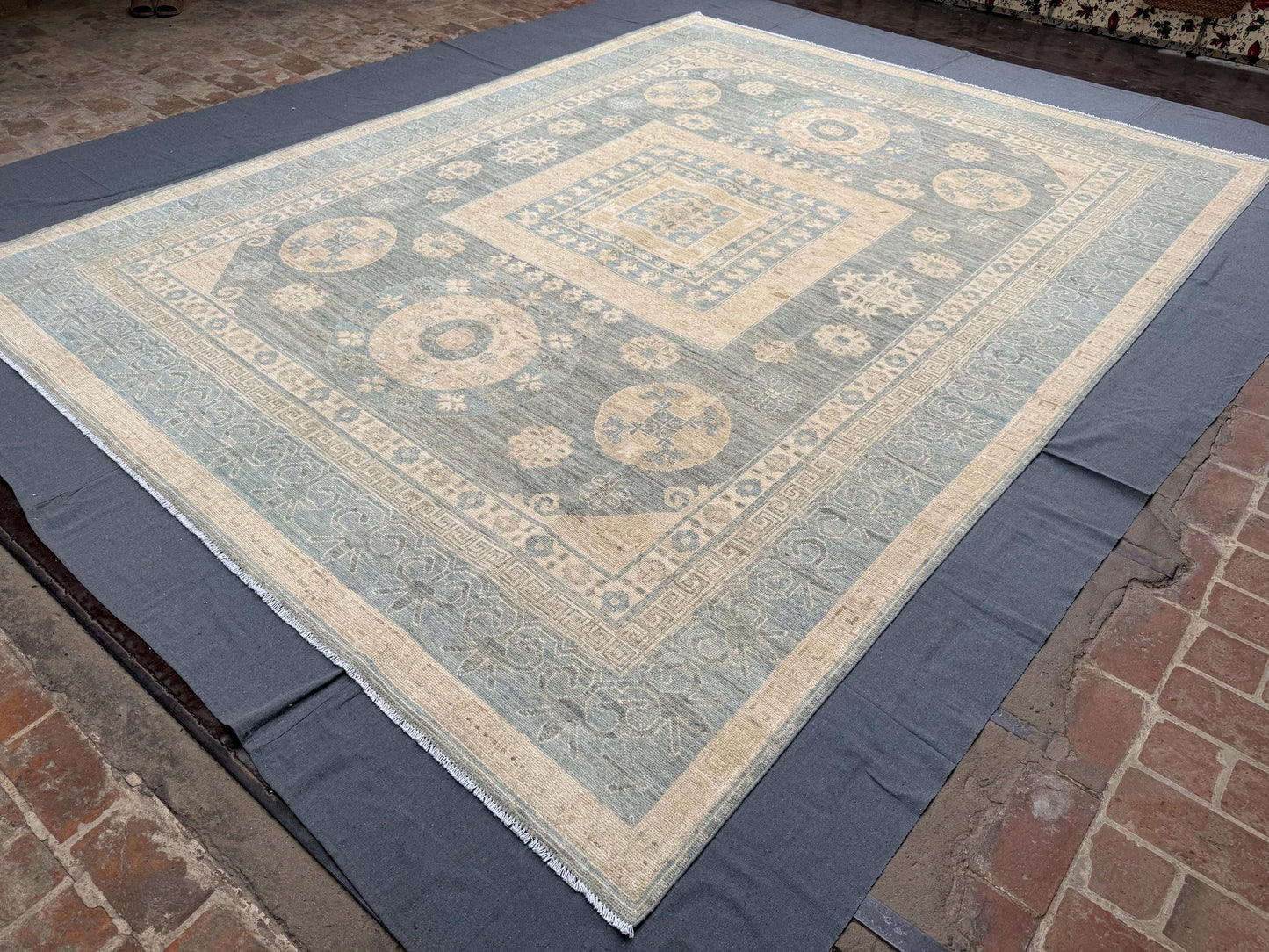 Handmade Turkish Oriental Rug 9x12 ft – Luxurious Wool Carpet with Subtle Geometric Motifs and Soft Pastel Tones for Living Spaces