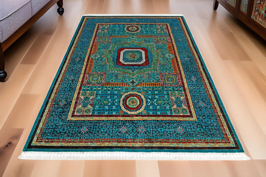 Handwoven Persian Wool Silk Rug 5.6x7.8 ft – Intricate Turquoise & Gold Medallion Carpet – Luxury Oriental Wool Rug for Elegant Interiors